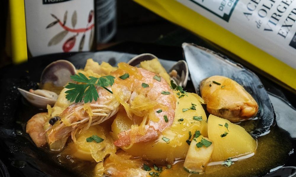 Suquet elaborado con mejor aceite de oliva virgene extra Suquet elaborado con el mejor aceite de oliva virgene extra