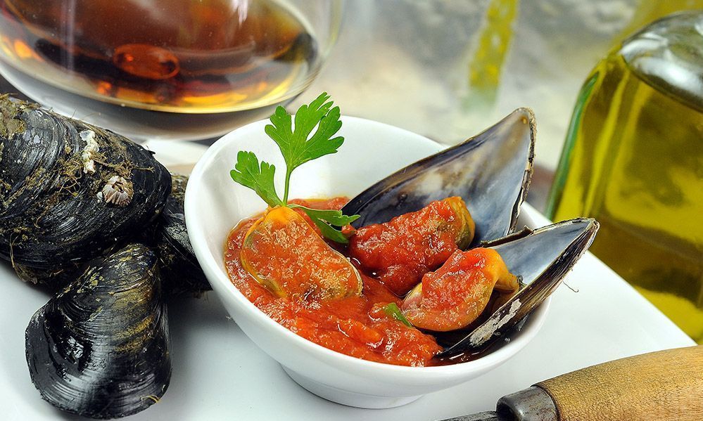 Mejillones al brandy hechos con un excelente virgen extra
