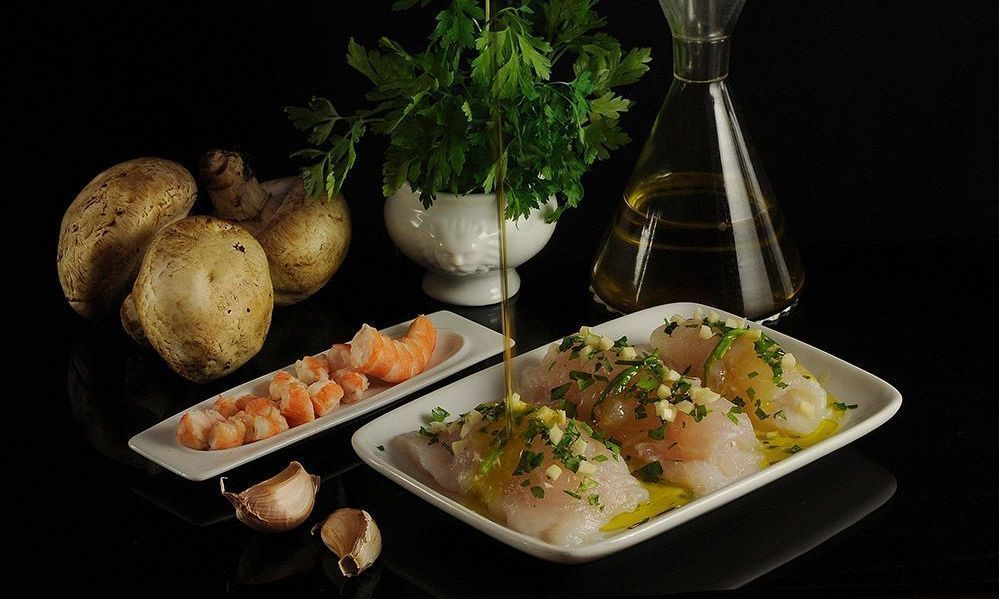 Pescado en rollitos hechos con un excelente virgen extra